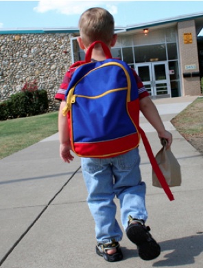 Boy with backpack walks to school should i give my child ritalin